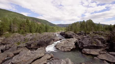 Aerial-of-a-small-river-with-rapids-and-pools-in-northern-Norway