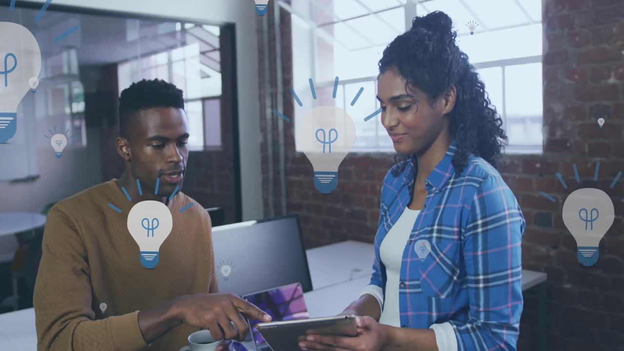 Animation of light bulb icons and data processing over diverse business people