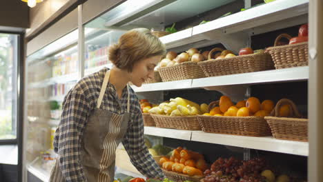 woman working in a grocery store