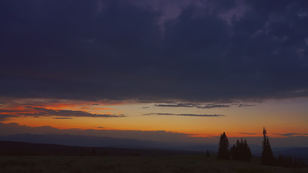 Sunset Over Mountain Range - Timelapse
