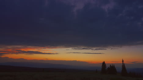 sunset over mountain range - timelapse