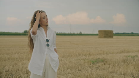 Pensive-Thoughtful-Woman-In-Field