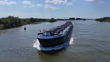 Aerial-view-of-industrial-ship-in-the-water-carrying-equipment