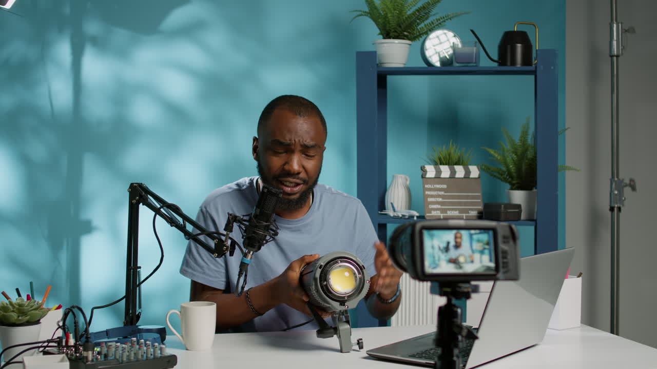 Black influencer talking about studio light for vlog review