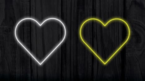 Animation-of-white-and-yellow-neon-hearts-flashing-on-dark-streaked-background