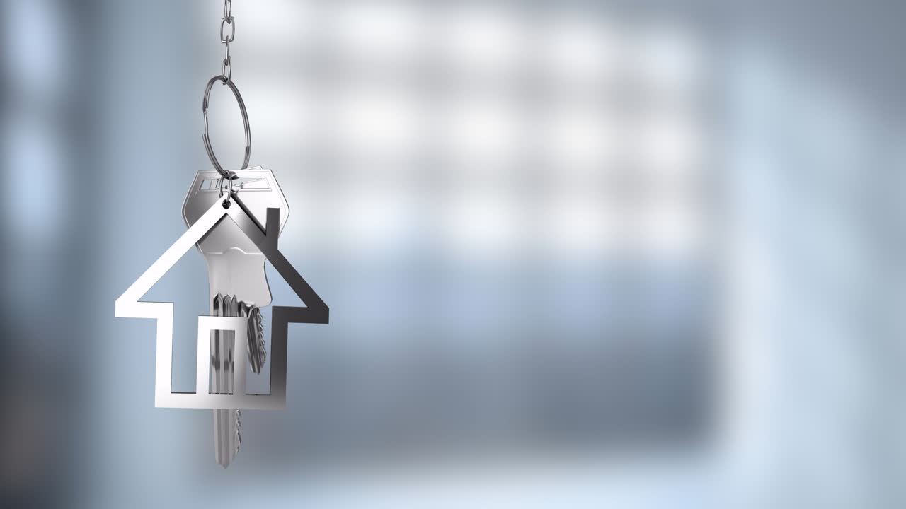 animación de llavero en forma de casa sobre un fondo borroso