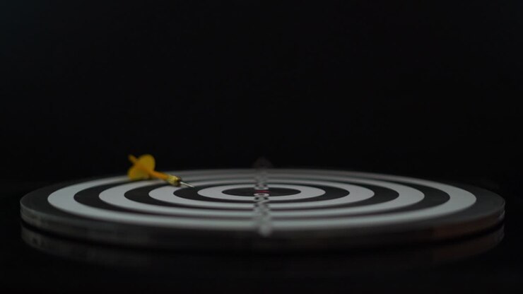 Slow motion arrow is pushing the target to the points of the score board.