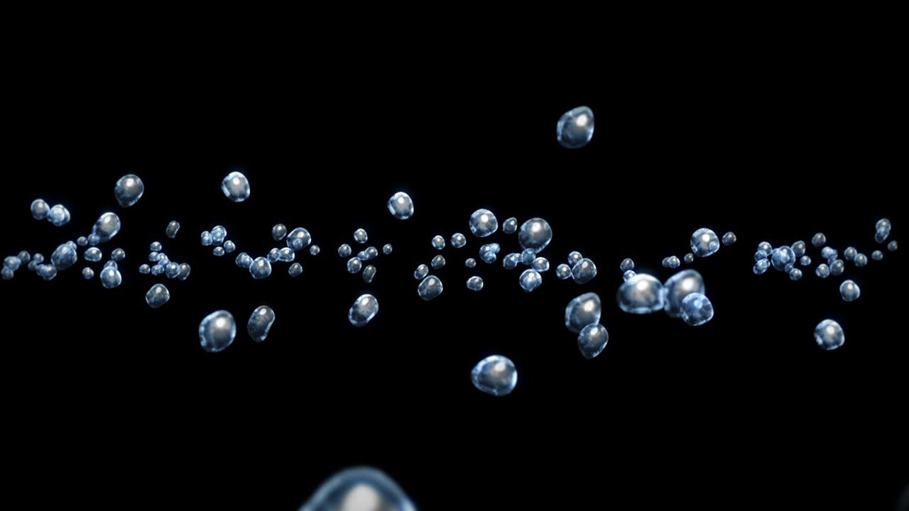 Flying many water drops on black background. Pure droplets. Transparent surface. 3D animation of air bubbles rotating. Loop animation.