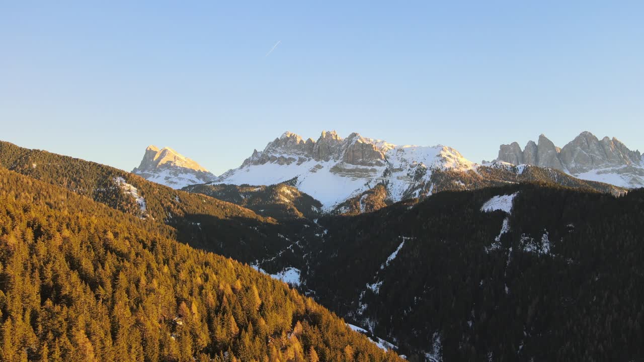 beautiful aerial drone video of the massive dolomite mountains in the Italian alps filmed in 4k in winter - fall