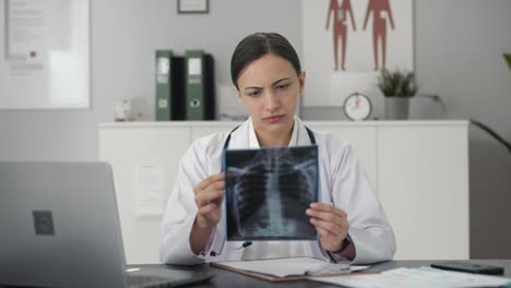 Indian-female-doctor-checking-X-ray-test