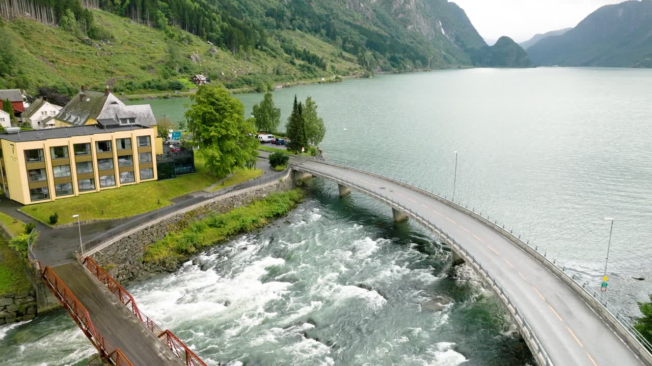 Aerial View of a Scenic Fjord in Norway with a Bridge and Hotel