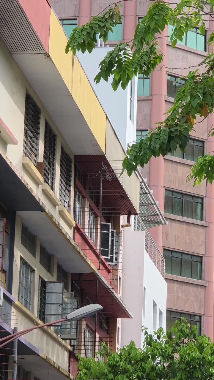 Vertical View Of High-rise Apartment And Hotel Buildings In Kota Kinabalu, Sabah, Malaysia. - wide shot