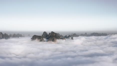 clouds over xianggong mountain peaks, aerial panoramic view