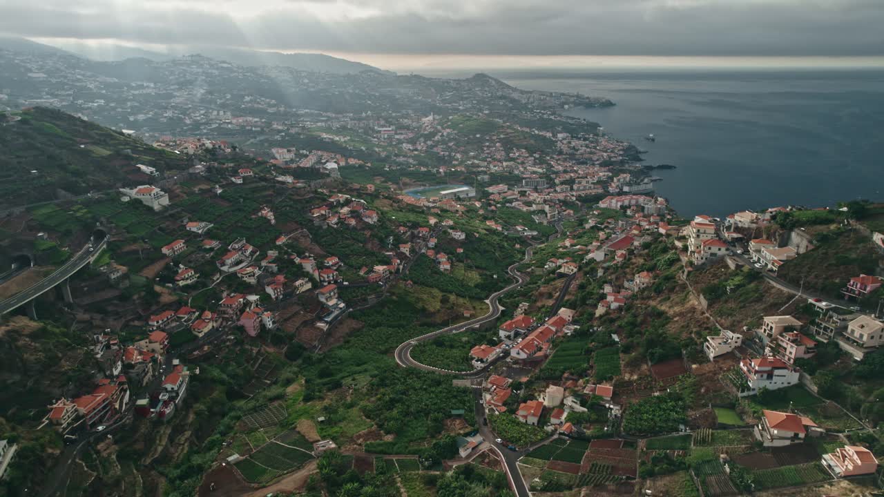 Madeira, villages and roads, scenic panorama, hills, coast, aerial, drone