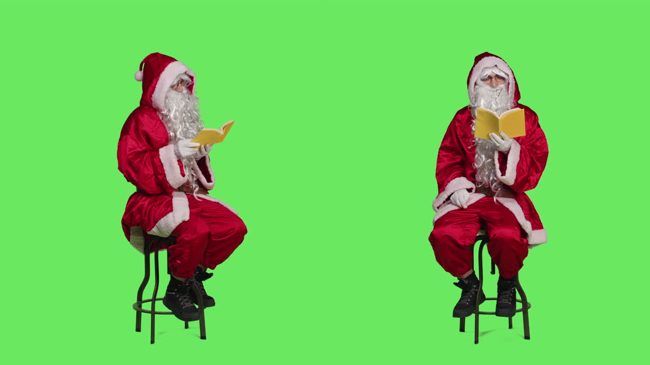 Santa Claus Reading a Book on Green Screen