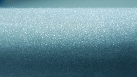 stream of sparkling metal particles in a thick acrylic base. eco-friendly car enamel. anticorrosive coating in metalworking