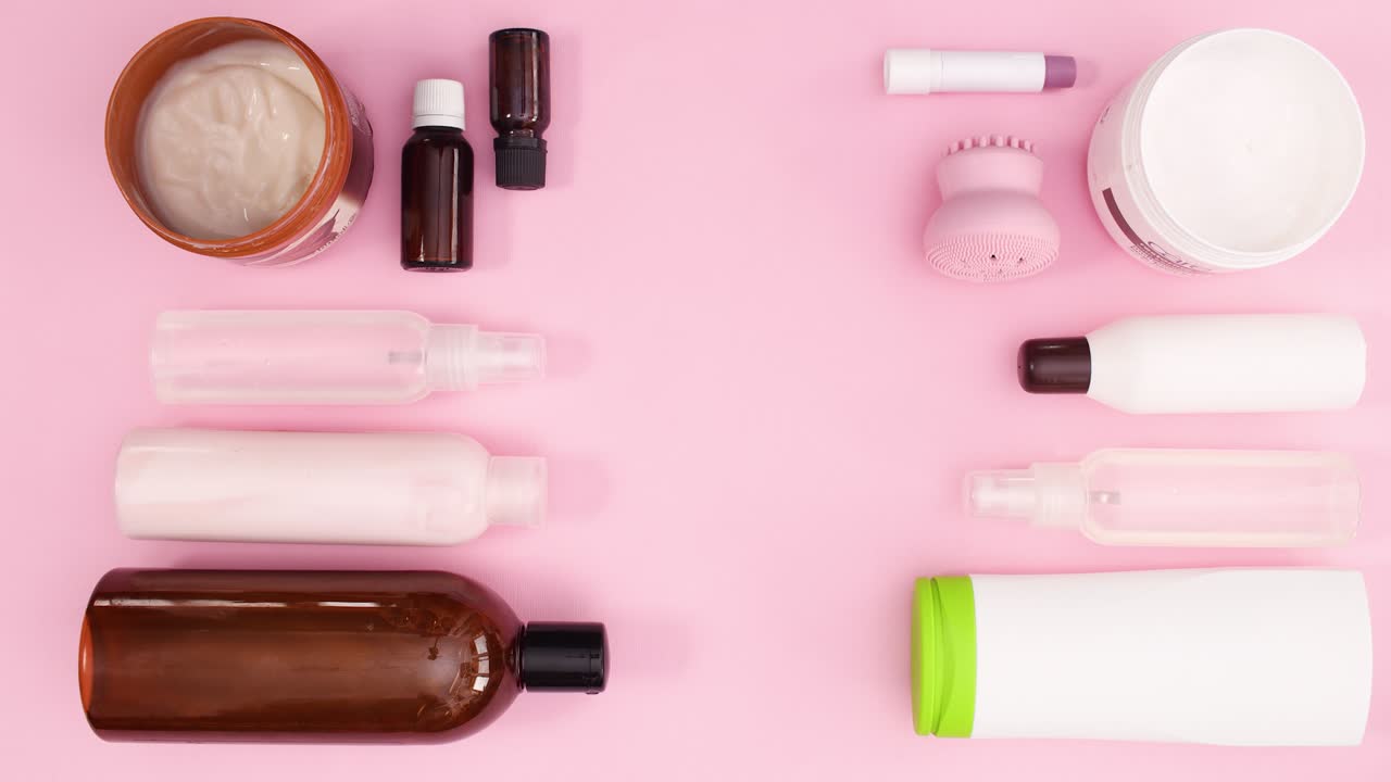 Spa beauty products move on pink theme. Stop motion