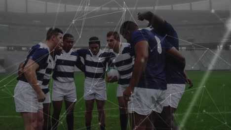 Animation-of-network-of-connections-over-team-of-diverse-male-rugby-players-discussing-together