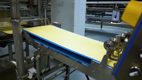 many types of high quality pasta been produced at a large modern pasta factory