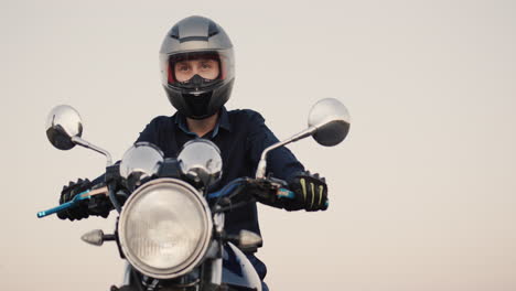 portrait of a young biker getting ready for a motorcycle ride 1