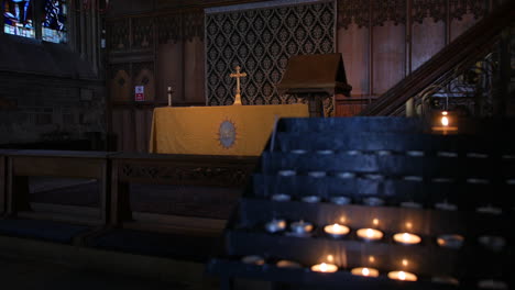 alter and burning candles in a church cathedral