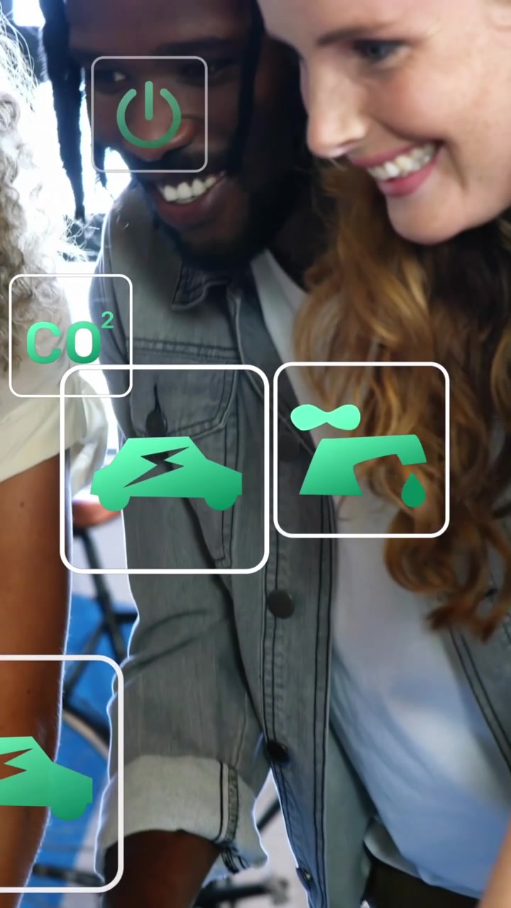 Animation of eco icons over diverse business people in office
