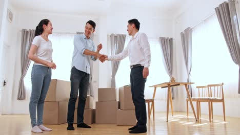 happy family moving into their new home