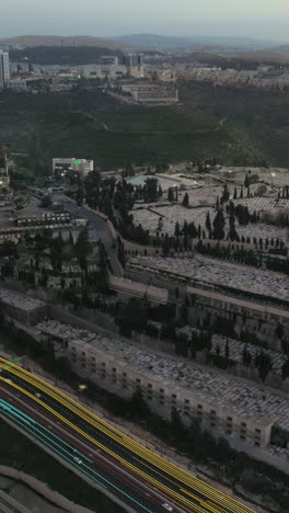 digital lines showing the traffic at the entrance to jerusalem, israel and har hamenuchot - vertical video