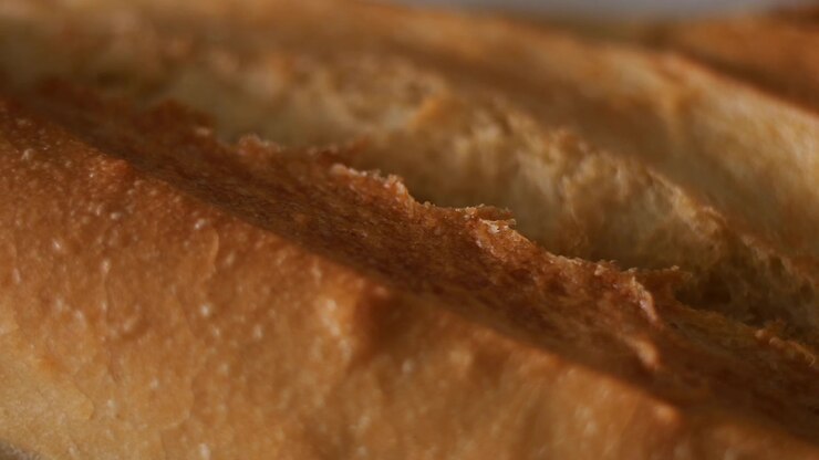 50p macro overhead slider shot moving across rustic bread texture