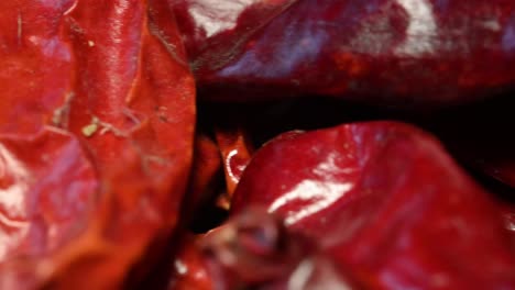 macro view of dried chilies from mexico, japones, dried chile piment seche, right to left