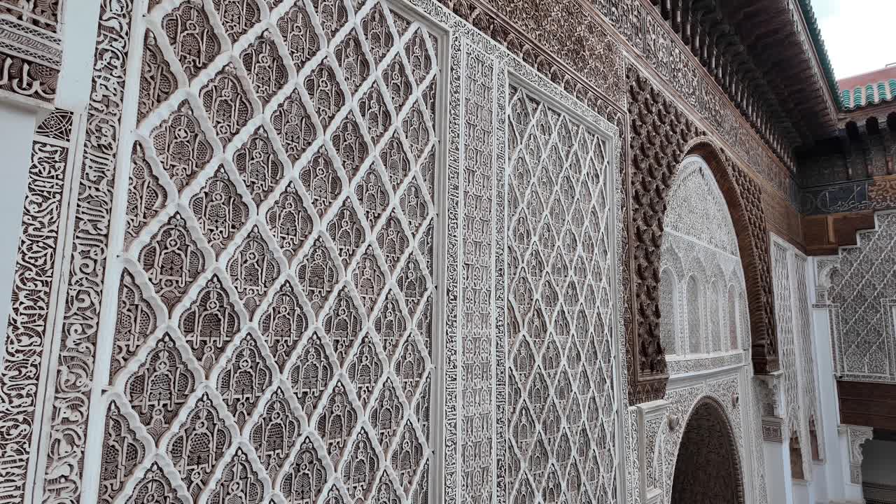 Walls with islamic art design inside Medersa Ben Youssef, Marrakech Morocco