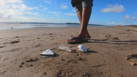 a human walked away from a trash on