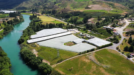 Farming-field-in-Central-otago,-roxburgh-area,-Nez-Zealand-from-above,-covered-with-agricultural-film