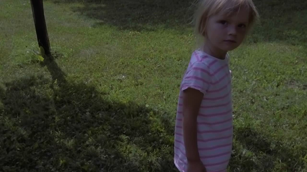 girl turning and looking straight at the camera with attitude before walking off in slow motion, copy space