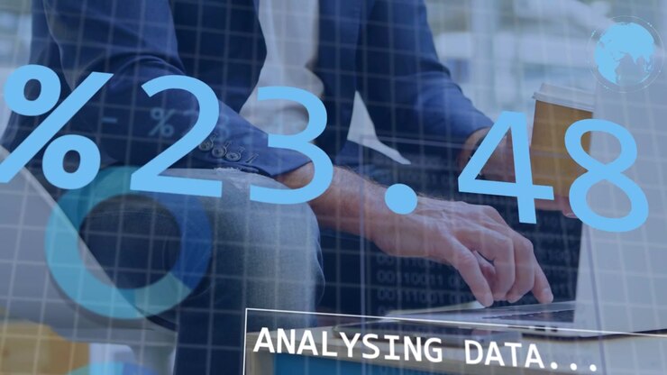 Mature man typing laptop, causing ANALYSING DATA