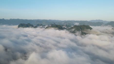 drone timelapse of ocean of cloud and mountain range