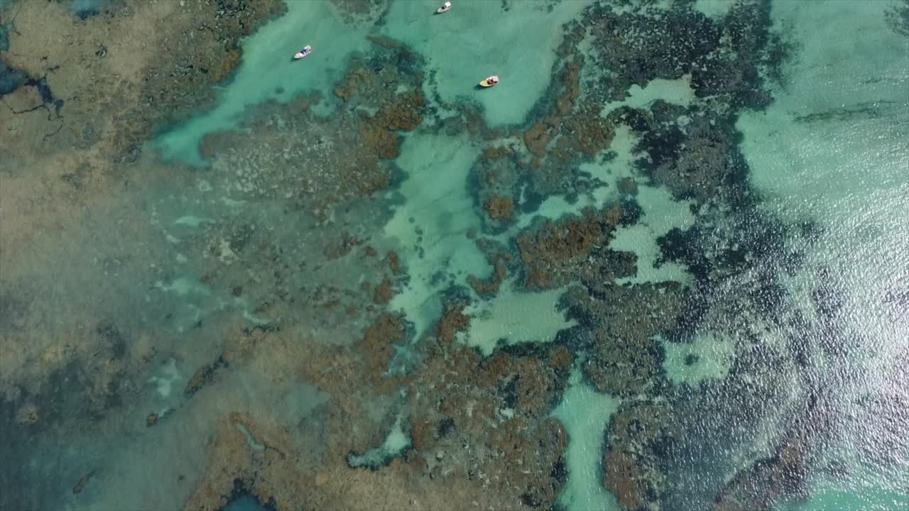 Beautiful Colored Reefs from Above Pan up to Brazil City Skyscraper Coastline