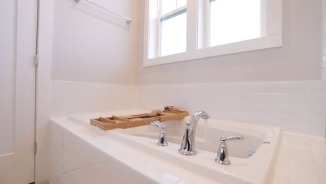 Running-Water-From-Luxury-Bathroom-White-Sink