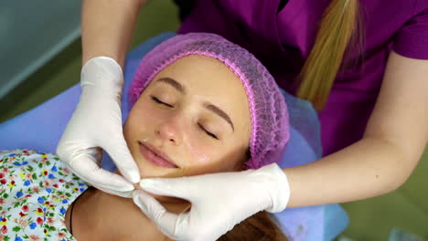 spa facial massage. face massage in beauty spa salon. beauty treatments. body care, skin care, wellness, wellbeing, beauty treatment concept.