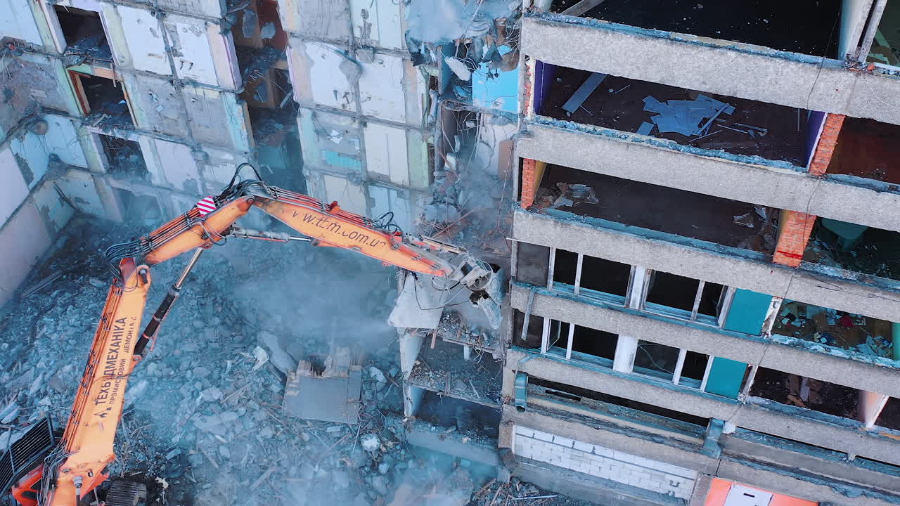 Demotion old house. Destruction of a building using technology