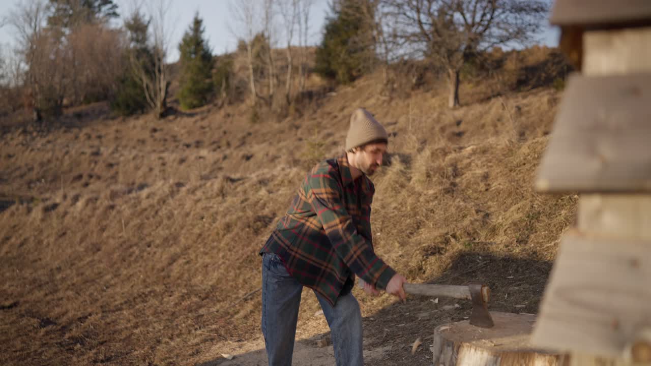 A lumberjack chopping wood in the forest