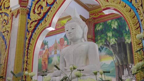 white statue buhhda in church of wat chalong phuket,thailand