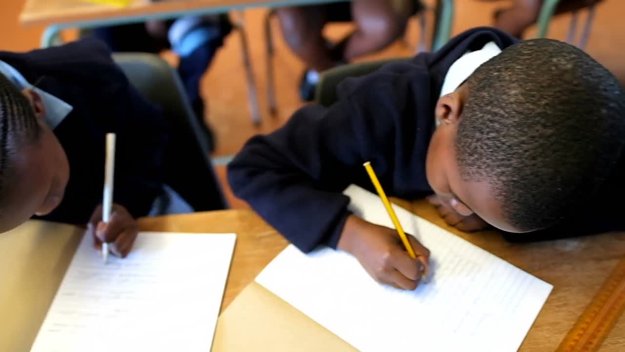 Schoolkids studying in the classroom at school 4k