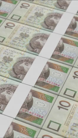 vertical video of 10 polish zloty banknotes printed by a money press