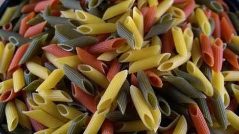 macaroni pasta ina plate on the table. close up.