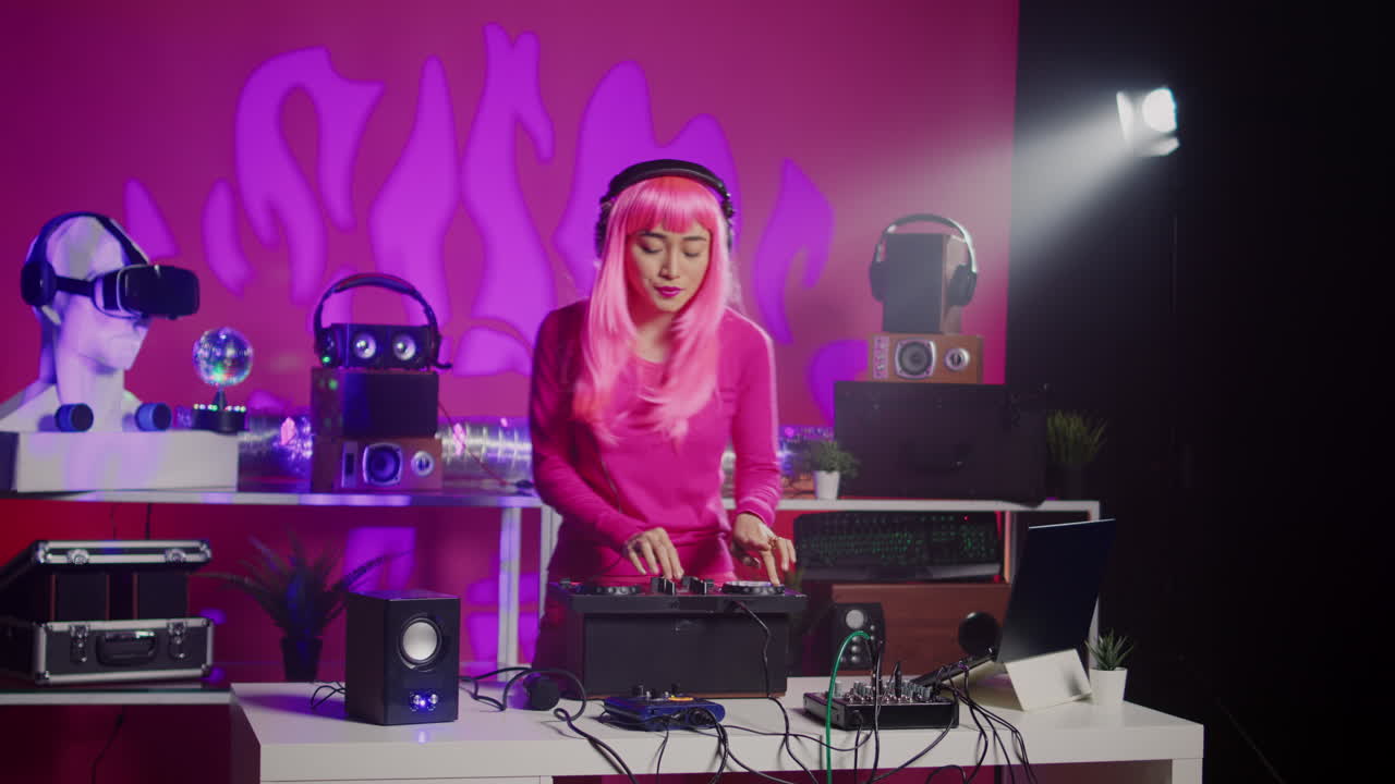Female DJ with Pink Hair Mixing Music