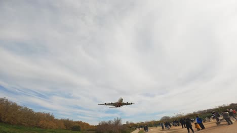 plane landing over park