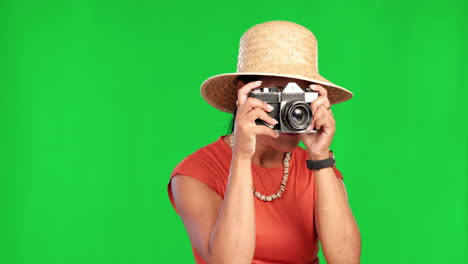 fotógrafo, pantalla verde y mujer de vacaciones