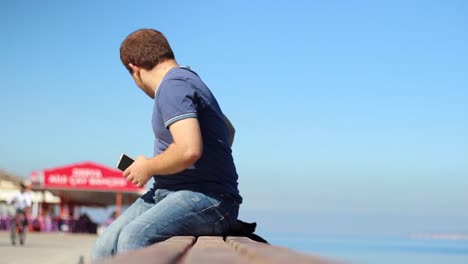 Lonely-Romantic-Man-Looks-At-Ocean