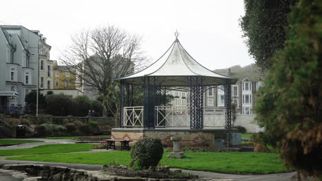 Runnymede-Bandstand---Jubilee-Gardens-At-Ilfracombe,-North-Devon-Coast,-England,-United-Kingdom-On-A-Windy-Day